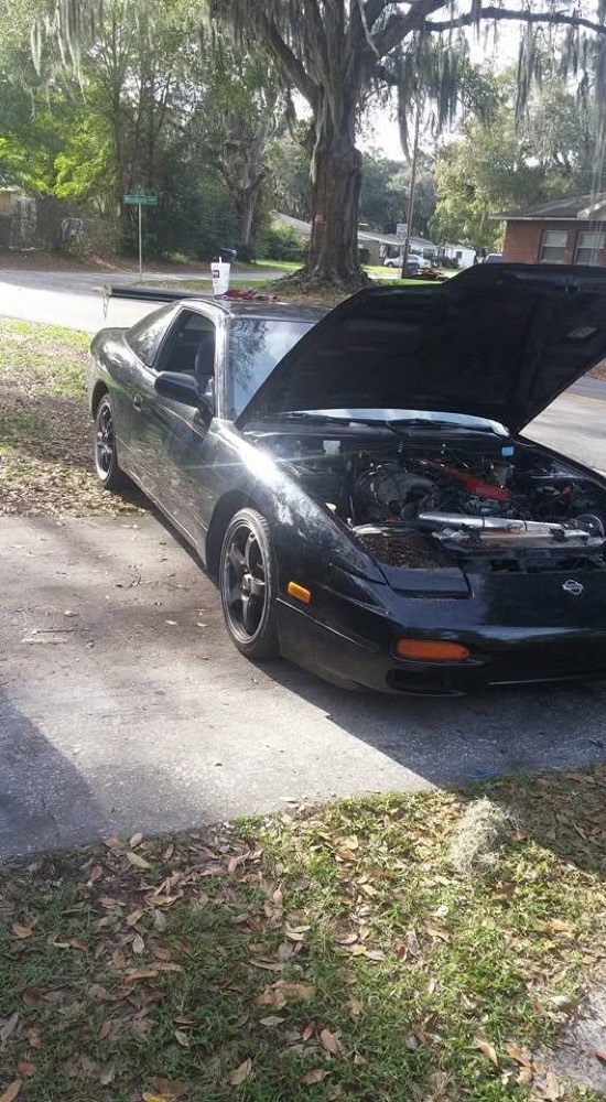 Nissan 240SX in the shop with engine work underway